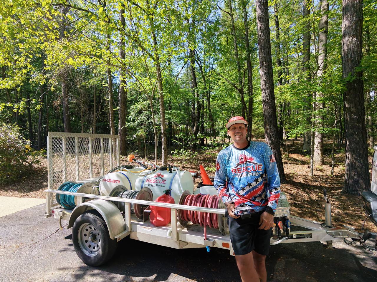 Owner of Rescue Wash Pros with the soft washing & pressure washing rig