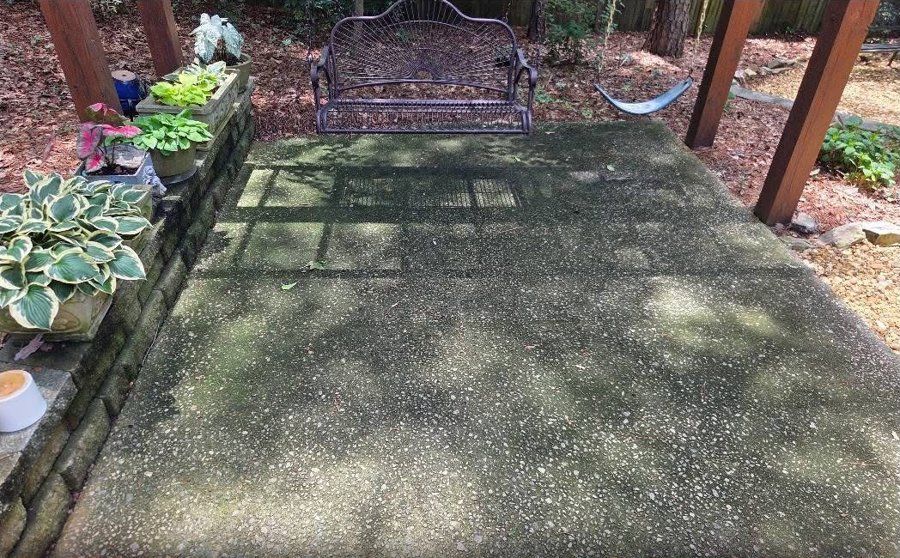 Exposed aggregate patio pressure wash before